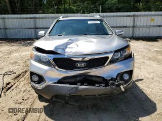 2013 Kia Sorento LX with VIN 5XYKT3A61DG372659, listed as a Copart auction lot 57787855 with 61,489 mi miles and Salvage title. Bid and sale history available at DreamBid. Image 5.