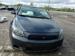 2009 Scion tC z VIN JTKDE167290296111, wystawiony jako Copart lot #55486315 z przebiegiem Nie podano mil oraz Szkoda całkowita • Salvage title. Historia ofert i sprzedaży dostępna na DreamBid. Obrazek 13.