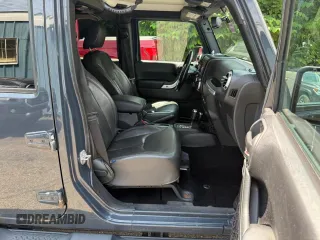 2016 Jeep Wrangler Unlimited Sahara with VIN 1C4BJWEG9GL169490, listed as a Copart auction lot 61507025 with 198,602 mi miles and Clean title. Bid and sale history available at DreamBid. Image 5.