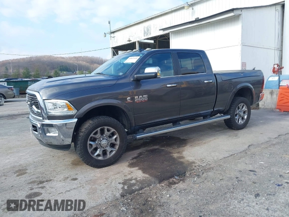 2016 Ram 2500 Laramie Longhorn with VIN 3C6UR5GLXGG330200, listed as a IAAI auction lot 40861684 with 79,427 mi miles and . Bid and sale history available at DreamBid. Image 2.