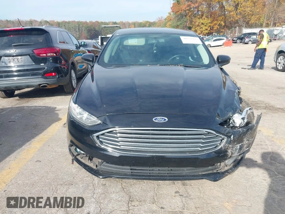 2018 Ford Fusion SE with VIN 3FA6P0HDXJR157605, listed as a IAAI auction lot 40979897 with 128,322 mi miles. Bid and sale history available at carsss.com. Image 11.