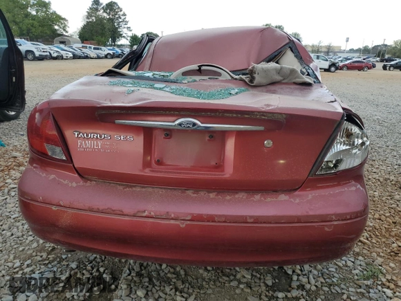 2000 Ford Taurus SES with VIN 1FAFP55U1YA262488, listed as a Copart auction lot 52312645 with 128,621 mi miles and Salvage Title. Bid and sale history available at DreamBid. Image 6.