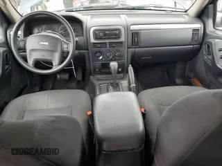 2004 Jeep Grand Cherokee Laredo with VIN 1J4GW48S04C125931, listed as a Copart auction lot 59972695 with 198,403 mi miles and Salvage title. Bid and sale history available at DreamBid. Image 8.