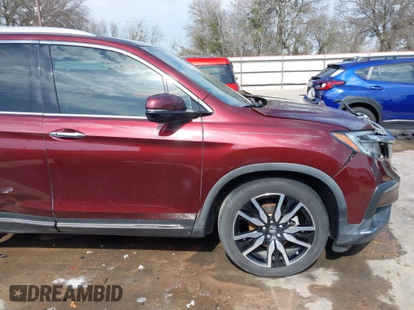 2019 Honda Pilot Touring 8-Passenger z VIN 5FNYF5H95KB009122, wystawiony jako IAAI lot #41573338 z przebiegiem 85 845 mil mil oraz . Historia ofert i sprzedaży dostępna na DreamBid. Obrazek 19.