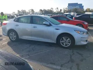 2017 Kia Optima LX with VIN 5XXGT4L34HG148794, listed as a IAAI auction lot 41586664 with 70,723 mi miles. Bid and sale history available at carsss.com. Image 13.
