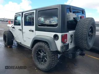 2014 Jeep Wrangler Unlimited Rubicon with VIN 1C4BJWFG2EL264792, listed as a IAAI auction lot 40938380 with 145,886 mi miles. Bid and sale history available at carsss.com. Image 3.