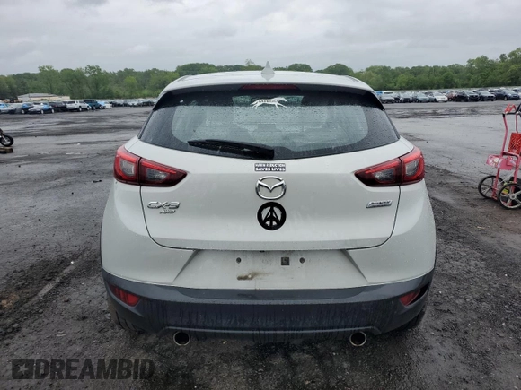 2016 Mazda CX-3 Grand Touring z VIN JM1DKBD77G0105451, wystawiony jako Copart lot #58341495 z przebiegiem 109 525 mil mil oraz Szkody całkowita. Historia ofert i sprzedaży dostępna na DreamBid. Obrazek 6.
