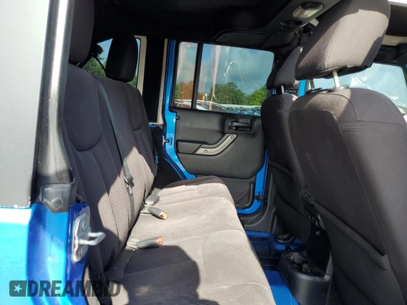 2015 Jeep Wrangler Unlimited Sport with VIN 1C4BJWDG1FL683558, listed as a Copart auction lot 59883545 with 107,267 mi miles and Salvage title. Bid and sale history available at DreamBid. Image 11.
