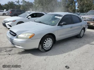 2003 Ford Taurus LX with VIN 1FAFP52U43A110444, listed as a Copart auction lot 83557764 with 118,897 mi miles and Salvage Title. Bid and sale history available at carsss.com. Image 1.