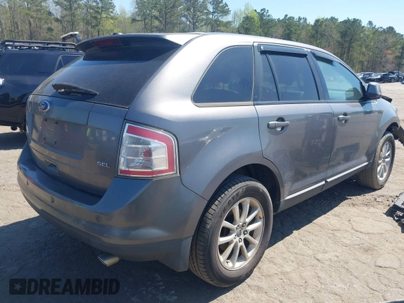 2010 Ford Edge SEL with VIN 2FMDK3JC0ABA36885, listed as a IAAI auction lot 41869192 with 187,549 mi miles. Bid and sale history available at carsss.com. Image 4.