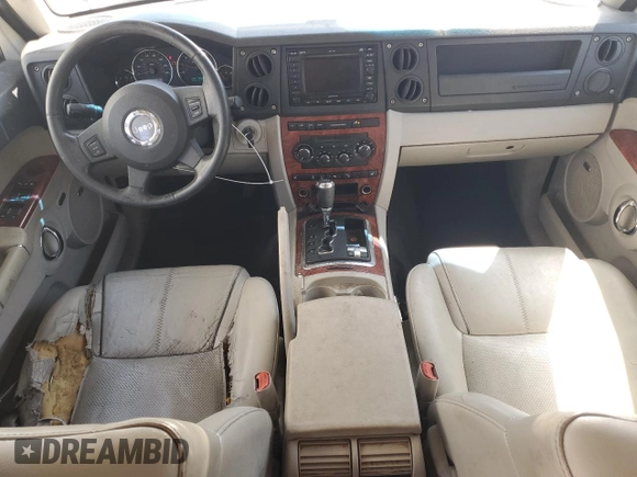 2007 Jeep Commander Limited with VIN 1J8HG58287C608187, listed as a Copart auction lot 52937855 with 163,456 mi miles and Salvage title. Bid and sale history available at DreamBid. Image 8.