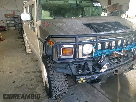 2003 Hummer H2 with VIN 5GRGN23U53H101713, listed as a Copart auction lot 85216034 with 189,549 mi miles and Non Repairable. Bid and sale history available at carsss.com. Image 11.