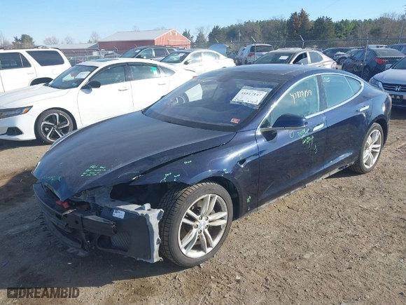 2013 Tesla Model S with VIN 5YJSA1CN7DFP28067, listed as a IAAI auction lot 41817147 with 75,586 mi miles. Bid and sale history available at carsss.com. Image 2.