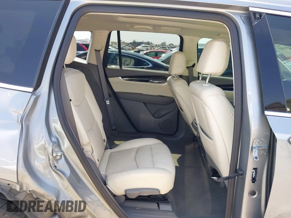 2023 Cadillac XT6 FWD Premium Luxury with VIN 1GYKPCRS6PZ163018, listed as a IAAI auction lot 42437403 with 21,366 mi miles and . Bid and sale history available at DreamBid. Image 8.