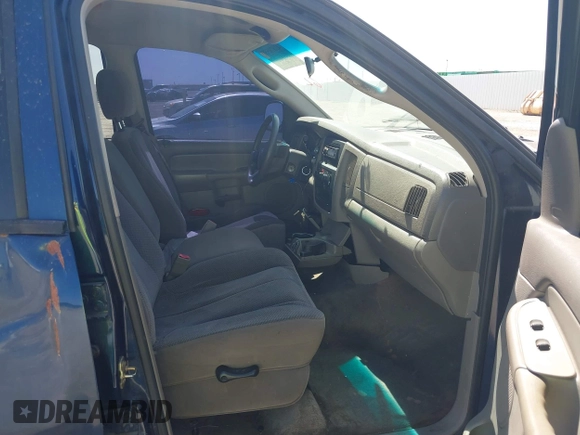 2004 Dodge 1500 SLT with VIN 1D7HA18N04J144868, listed as a IAAI auction lot 41870559 with 157,379 mi miles. Bid and sale history available at carsss.com. Image 5.