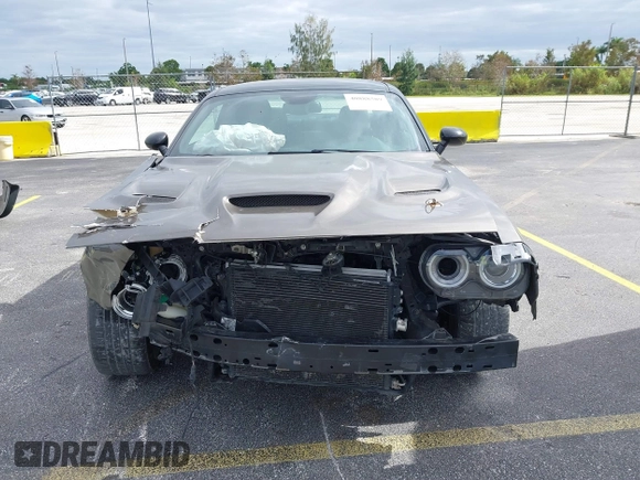 2016 Dodge Challenger R/T Scat Pack z VIN 2C3CDZFJ2GH254938, wystawiony jako IAAI lot #40888589 z przebiegiem 114 582 mil mil oraz . Historia ofert i sprzedaży dostępna na DreamBid. Obrazek 13.