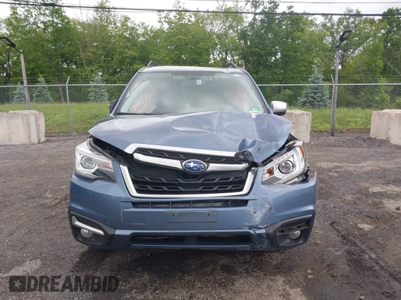 2018 Subaru Forester Touring with VIN JF2SJAWC5JH528330, listed as a IAAI auction lot 42344618 with 62,446 mi miles and . Bid and sale history available at DreamBid. Image 12.