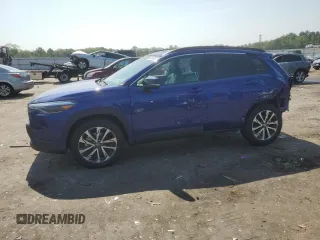 2025 Toyota Corolla Cross XLE with VIN 7MUDAABG6SV132135, listed as a Copart auction lot 64364695 with 2,145 mi miles and Salvage title. Bid and sale history available at DreamBid. Image 1.