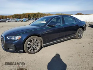 2023 Audi A8 with VIN WAULDAF86PN002950, listed as a Copart auction lot 77352374 with 4,444 mi miles and Salvage Title. Bid and sale history available at carsss.com. Image 1.
