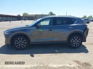 2017 Mazda CX-5 Grand Touring with VIN JM3KFADL6H0217850, listed as a IAAI auction lot 42033404 with 74,198 mi miles and . Bid and sale history available at carsss.com. Image 15.