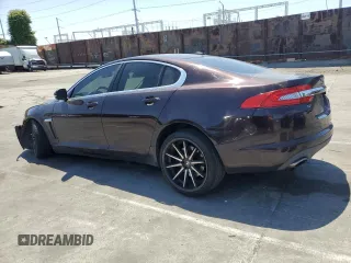 2015 Jaguar XF V6 Portfolio with VIN SAJWA0F79F8U60216, listed as a Copart auction lot 54969245 with 88,954 mi miles and Salvage Title. Bid and sale history available at carsss.com. Image 2.