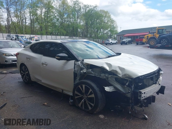 2017 Nissan Maxima SV z VIN 1N4AA6AP3HC434557, wystawiony jako IAAI lot #42203547 z przebiegiem 121 518 mil mil oraz . Historia ofert i sprzedaży dostępna na DreamBid. Obrazek 1.