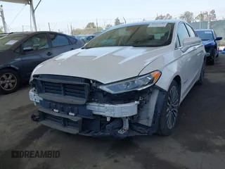 2017 Ford Fusion Hybrid Titanium with VIN 3FA6P0RU8HR229653, listed as a IAAI auction lot 42445182 with 163,279 mi miles and . Bid and sale history available at DreamBid. Image 17.