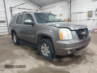 2011 GMC Yukon SLT z VIN 1GKS2CE02BR336524, wystawiony jako IAAI lot #42189541 z przebiegiem 226 321 mil mil oraz . Historia ofert i sprzedaży dostępna na DreamBid. Obrazek 1.