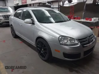 2009 Volkswagen Jetta Sedan SE with VIN 3VWRM71K09M033754, listed as a IAAI auction lot 41949678 with 198,344 mi miles. Bid and sale history available at carsss.com. Image 1.