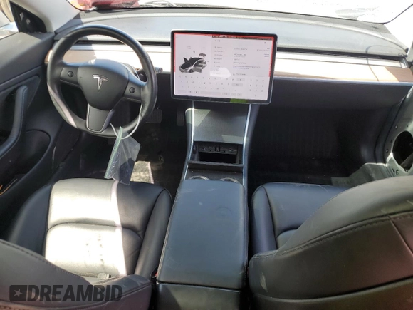 2018 Tesla Model 3 Long Range Battery with VIN 5YJ3E1EA2JF016631, listed as a Copart auction lot 55527095 with 129,547 mi miles and Salvage Title. Bid and sale history available at DreamBid. Image 8.