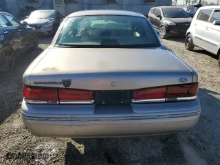1995 Ford Crown Victoria LX with VIN 2FALP74W7SX106035, listed as a Copart auction lot 81968554 with 64,150 mi miles and Clean Title. Bid and sale history available at carsss.com. Image 6.