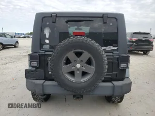 2011 Jeep Wrangler Rubicon with VIN 1J4BA6D15BL585388, listed as a Copart auction lot 76272184 with 119,043 mi miles and Clean title. Bid and sale history available at DreamBid. Image 6.