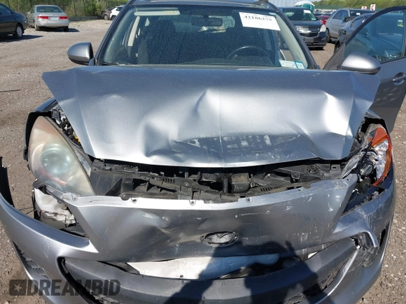 2013 Mazda 3 i Touring z VIN JM1BL1LP2D1742494, wystawiony jako IAAI lot #42186275 z przebiegiem 150 046 mil mil oraz . Historia ofert i sprzedaży dostępna na DreamBid. Obrazek 10.
