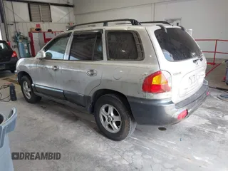 2003 Hyundai Santa Fe GLS z VIN KM8SC13D03U468114, wystawiony jako IAAI lot #42399443 z przebiegiem 185 851 mil mil oraz . Historia ofert i sprzedaży dostępna na DreamBid. Obrazek 3.