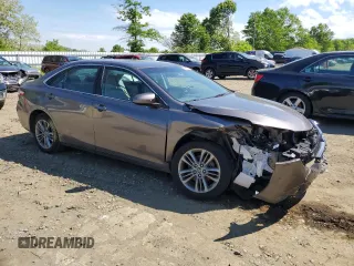 2015 Toyota Camry XLE with VIN 4T1BF1FK7FU069352, listed as a Copart auction lot 56123125 with 137,244 mi miles and Salvage Title. Bid and sale history available at DreamBid. Image 4.