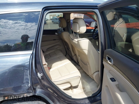 2015 Jeep Grand Cherokee Overland with VIN 1C4RJFCG6FC831641, listed as a IAAI auction lot 41877680 with 143,568 mi miles. Bid and sale history available at carsss.com. Image 8.