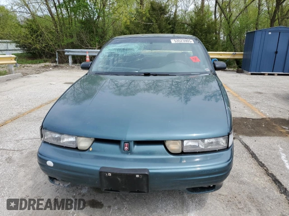 1997 Oldsmobile Cutlass Supreme S z VIN 1G3WH52MXVF317238, wystawiony jako Copart lot #53523905 z przebiegiem 135 925 mil mil oraz Szkody całkowita. Historia ofert i sprzedaży dostępna na DreamBid. Obrazek 5.