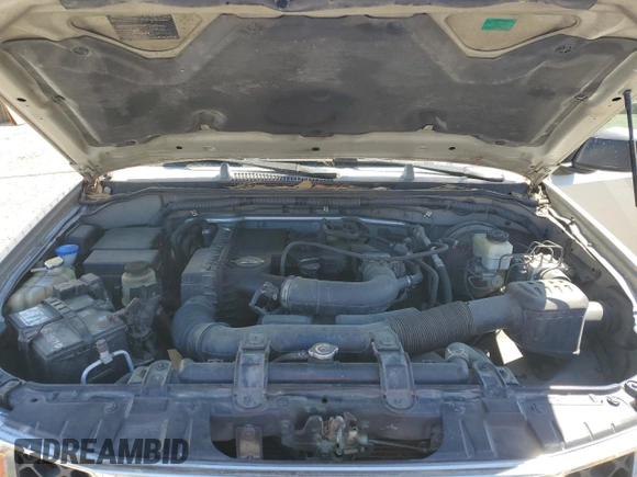 2006 Nissan Frontier XE with VIN 1N6BD06T56C432778, listed as a Copart auction lot 48866675 with 177,928 mi miles and Salvage title. Bid and sale history available at DreamBid. Image 11.
