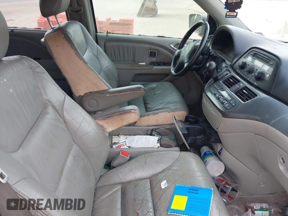 2005 Honda Odyssey TOURING with VIN 5FNRL38815B027811, listed as a IAAI auction lot 42105642 with 303,913 mi miles. Bid and sale history available at carsss.com. Image 5.