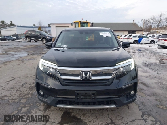 2020 Honda Pilot EX-L z VIN 5FNYF6H50LB022798, wystawiony jako IAAI lot #41592012 z przebiegiem 67 045 mil mil oraz . Historia ofert i sprzedaży dostępna na DreamBid. Obrazek 12.