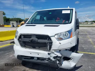 2020 Ford Transit Passenger XL with VIN 1FBAX2Y80LKA42137, listed as a IAAI auction lot 42802902 with 59,540 mi miles and . Bid and sale history available at DreamBid. Image 6.