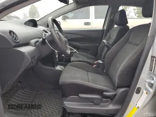 2009 Toyota Yaris z VIN JTDBT903691327542, wystawiony jako Copart lot #53231525 z przebiegiem 161 477 mil mil oraz Szkody całkowita. Historia ofert i sprzedaży dostępna na DreamBid. Obrazek 7.