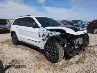 2021 Jeep Grand Cherokee Trailhawk with VIN 1C4RJFLG4MC703945, listed as a Copart auction lot 50703085 with 57,109 mi miles and Salvage Title. Bid and sale history available at carsss.com. Image 4.