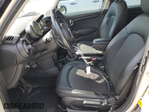 2016 MINI Hardtop 4 Door with VIN WMWXU1C59G2D08847, listed as a Copart auction lot 59763805 with 114,105 mi miles and Salvage title. Bid and sale history available at DreamBid. Image 7.