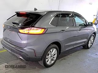 2021 Ford Edge Titanium z VIN 2FMPK3K92MBA53689, wystawiony jako IAAI lot #42501151 z przebiegiem 93 941 mil mil oraz . Historia ofert i sprzedaży dostępna na DreamBid. Obrazek 24.