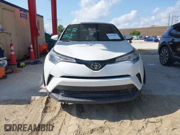 2019 Toyota C-HR XLE with VIN NMTKHMBX2KR087529, listed as a IAAI auction lot 42165493 with 130,053 mi miles and . Bid and sale history available at DreamBid. Image 6.