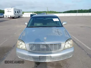 2003 Cadillac DeVille with VIN 1G6KD54YX3U102528, listed as a IAAI auction lot 42159424 with 108,720 mi miles. Bid and sale history available at carsss.com. Image 6.