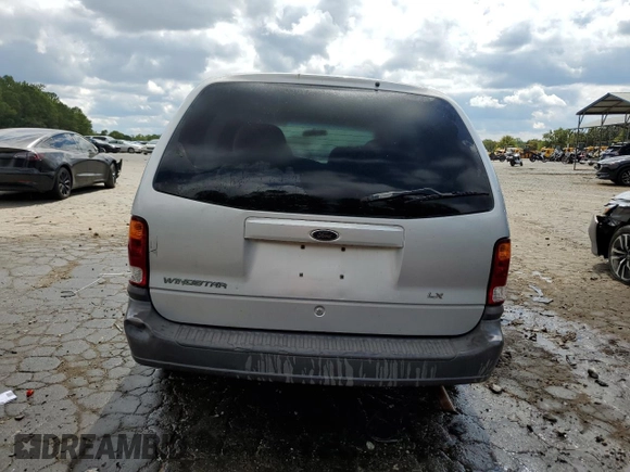 2002 Ford Windstar LX w/910A z VIN 2FMZA50412BB52175, wystawiony jako Copart lot #71832164 z przebiegiem Nie podano mil oraz Szkoda całkowita • Salvage title. Historia ofert i sprzedaży dostępna na DreamBid. Obrazek 6.