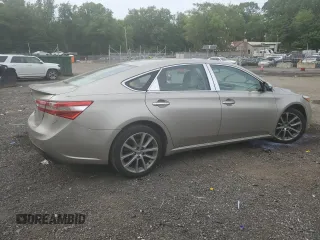 2014 Toyota Avalon Limited z VIN 4T1BK1EB7EU079438, wystawiony jako Copart lot #56710265 z przebiegiem 132 762 mil mil oraz Szkoda całkowita • Salvage title. Historia ofert i sprzedaży dostępna na DreamBid. Obrazek 3.