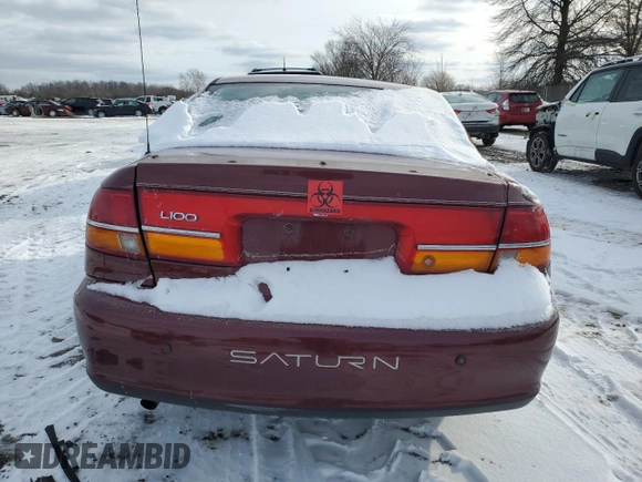 2002 Saturn LS z VIN 1G8JS54F12Y587561, wystawiony jako Copart lot #44496745 z przebiegiem Nie podano mil oraz Szkody całkowita. Historia ofert i sprzedaży dostępna na DreamBid. Obrazek 6.